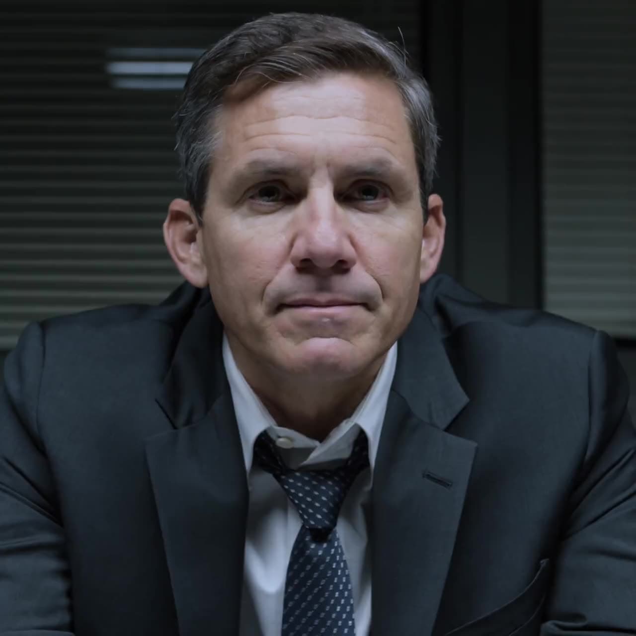 Cinematic extreme close-up of a serious man in a suit — a Kling 3.0 generation